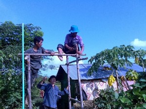 CP helping to build a toilet